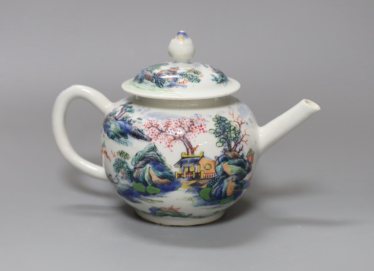 A Qianlong famille painted rose bullet shaped teapot and cover, 13.5cm tall